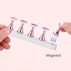 Etercycle nail stand in pink hue provides stable display and comfortable crafting posture.
