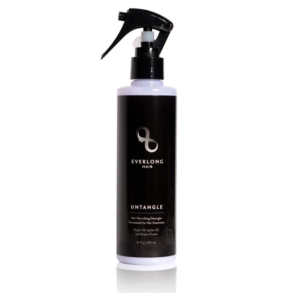 Everlong Untangle leave-in spray bottle eases detangling on extensions.