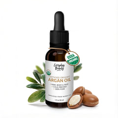 Everyday Beauty Organic Argan Oil bottle with dropper for precise hair and skin use.