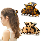 Eyegla hair claw clip, tortoise shell closeup, secure hold for fine to medium hair.