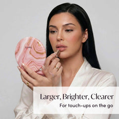 Fancii Taylor double-sided magnification for quick makeup and detail work.