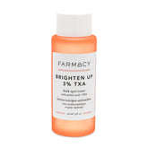 Farmacy 3% TXA Brightening Toner bottle close-up showing texture refinement.