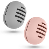 Fauxomor makeup sponge holder in grey and pink, organized on a vanity.