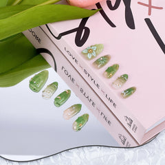 FDSQHSA gold beads embellishment creates chic, festive nail looks