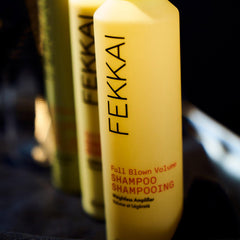 FEKKAI Full Blown Volume Shampoo pour stream on wet hair for even cleansing