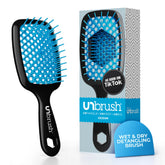 FHI Heat UNbrush detangling brush in ocean color for smooth, painless detangling.