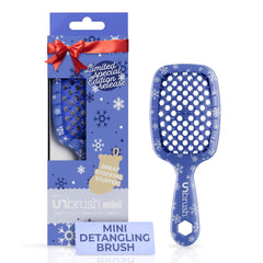 FHI Heat UNbrush Mini Holiday Brush bristles closeup for gentle detangling across hair types.