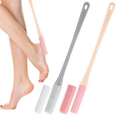 Fingertip WD foot scrubber with a long pink handle for easy feet cleaning in the shower.