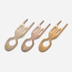 Replaces five bobby pins with one No.1 Hairpin for simple styling