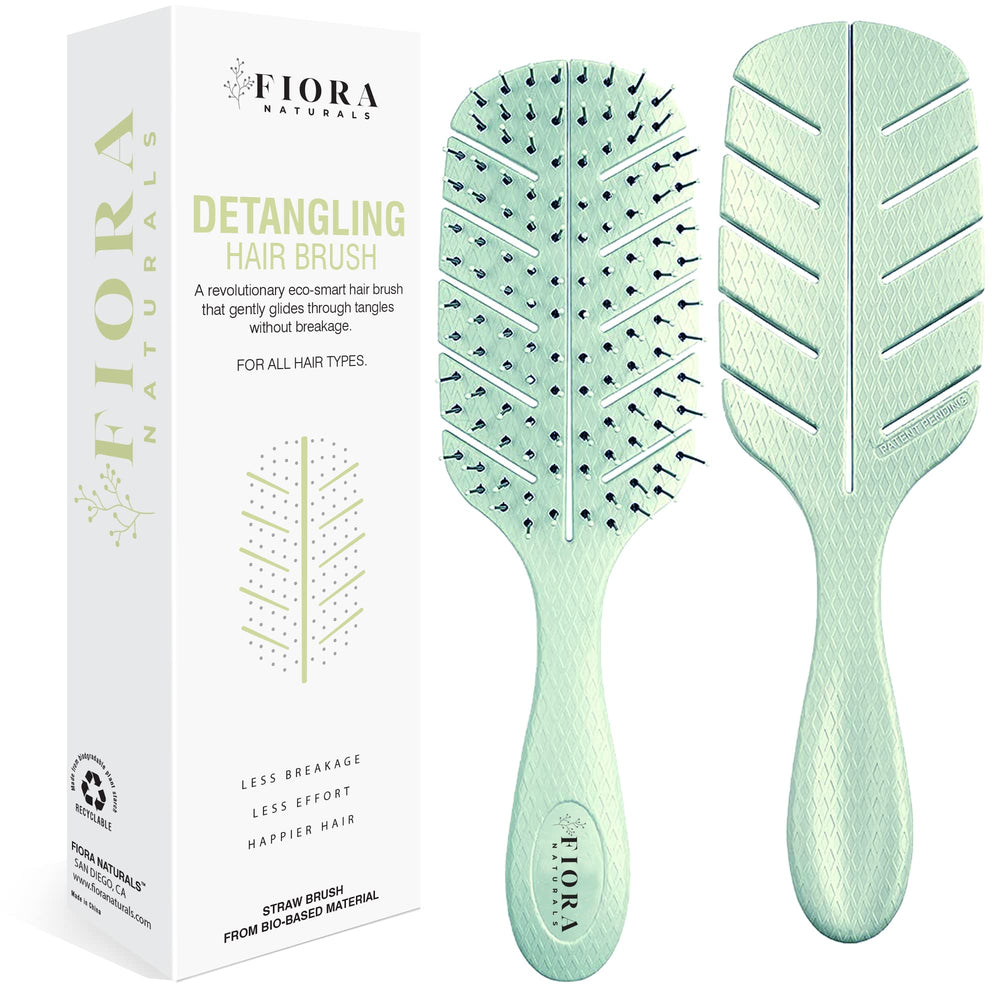 Fiora Naturals detangler brush with ultra-soft-bristles for gentle knot removal.