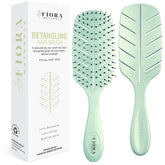 Fiora Naturals detangler brush with ultra-soft-bristles for gentle knot removal.