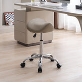 FIRAVOE saddle stool adjustable height aids precise seating during long appointments.