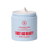 First Aid Beauty Ultra Repair Cream jar close-up showing rich, non-greasy hydration.