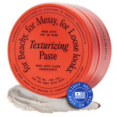 Firsthand Texturizing Paste jar closeup for natural hold and effortless shaping.