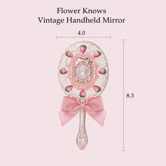 Flower Knows golden Cupid embellishment adds luxe detail to mirror