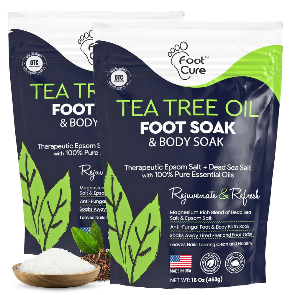 FOOT CURE Tea Tree Oil Foot Soak bottles for at-home spa pampering and foot relaxation.