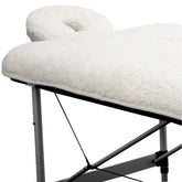 ForPro Premium Quilted Fleece Table Pad on a massage table provides extra cushioning for clients.