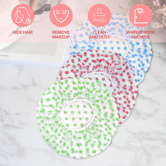 Fouews green dot-pattern shower cap fits securely with comfortable elastic