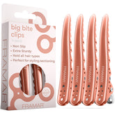 Clips FRAMAR rosa profesional 4-pack para estilizar el cabello con agarre firme.