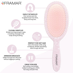 FRAMAR detangler brush gliding through knots on wet hair for less pulling