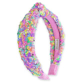 Diadema FROG SAC nudo arcoiris con lentejuelas rosa para estilos brillantes.