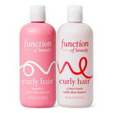 Function of Beauty Curly Shampoo bottle pour shows gentle cleansing for defined curls.