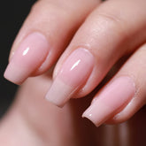 Botella de FZANEST Rose Nude, esmalte gel translúcido para un look natural.