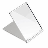 G2PLUS compact travel mirror shows a clear 4x3 inch reflection for quick touch-ups.