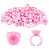 G2PLUS pink disposable glue rings provide clean, quick-use support for nail art and lash work.