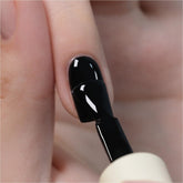 GAOY Black Gel Nail Polish bottle with brush shows smooth self-leveling finish.