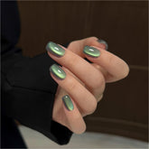 GAOY Green Cat Eye Gel Nail Polish Mossy Glade bottle with holographic shimmer.