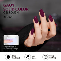 GAOY Jelly Purple Gel Nail Polish curing under UV lamp for quick dry.