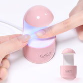 GAOY mini UV light nail lamp for quick gel nail curing at home
