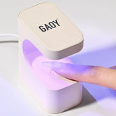 GAOY Mini UV Light for fast 60-second curing of gel nails.