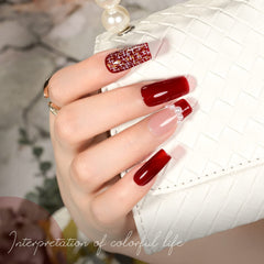 GAOY Sheer Red Gel Nail Polish brush closeup highlighting smooth application