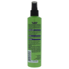 Garnier Fructis Full Control hairspray being applied for a touchable, frizz-free finish.