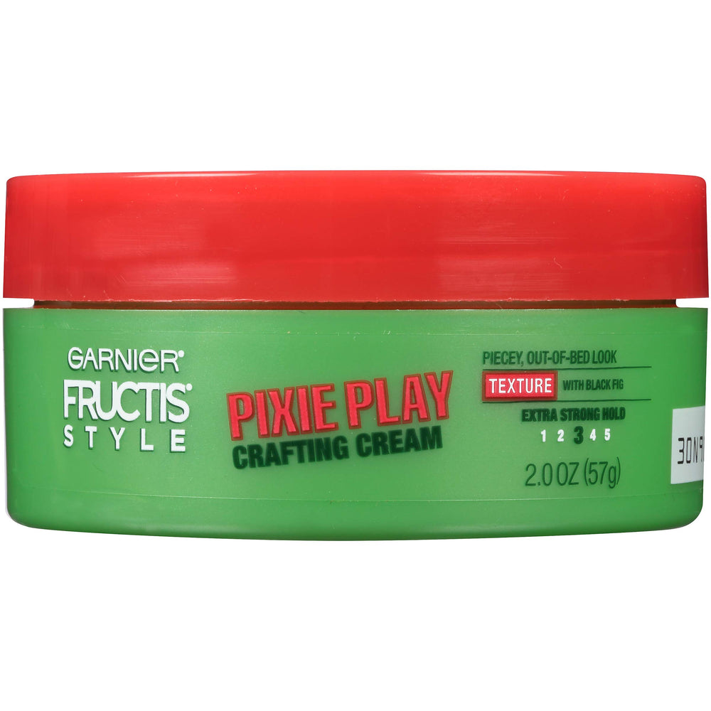 Garnier Fructis Pixie Play Crafting Cream packaging close-up for travel-friendly styling.