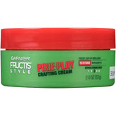 Garnier Fructis Pixie Play Crafting Cream packaging close-up for travel-friendly styling.