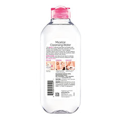 Garnier Micellar Water cotton pad removes makeup without rubbing for gentle cleansing.