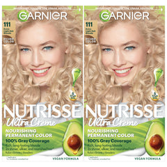 Garnier Nutrisse Ultra Creme bottle poured for even application.