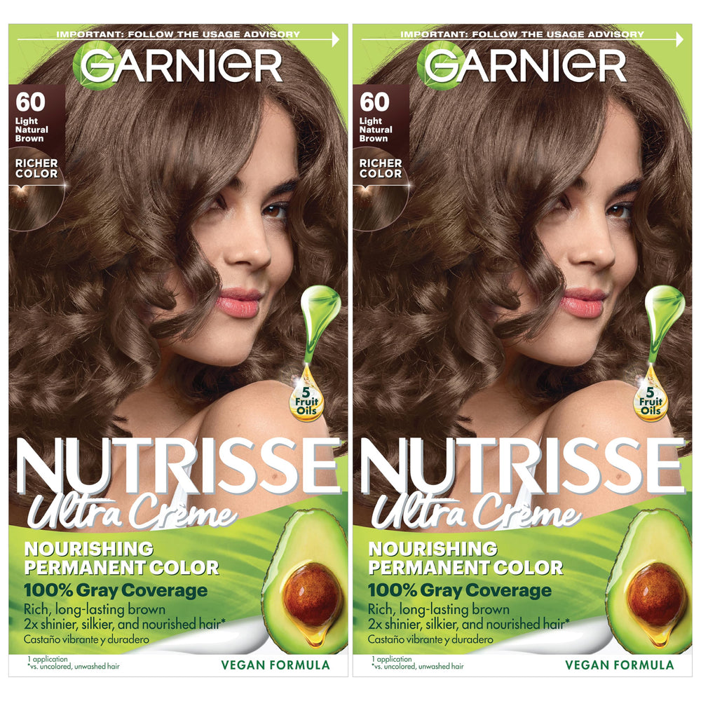Garnier Nutrisse Ultra Creme bottle with oil ampoule ready for nourishing color application.