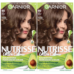 Garnier Nutrisse Ultra Creme bottle with oil ampoule ready for nourishing color application.