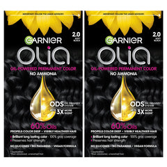 Garnier Olia soft black color application demonstrates ammonia-free formula for smooth coverage.