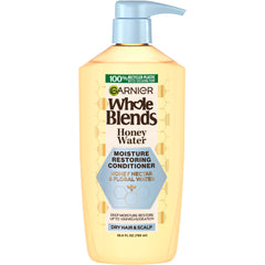 Garnier Whole Blends Honey Water conditioner bottle front highlights premium packaging and hydration benefits.