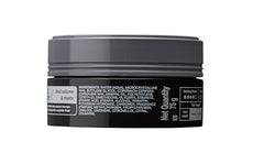 Hair being styled with Gatsby wax for luminous shine.