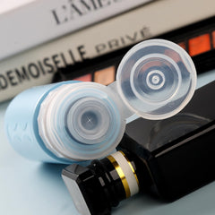 Gemice travel bottles wide-opening fill for easy refilling of thick liquids.
