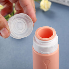 Gemice travel bottle shows wide opening for easy filling and cleaning.