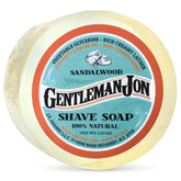 Gentleman Jon sandalwood shaving soap jar showing the product and rich lather ready for shaving.