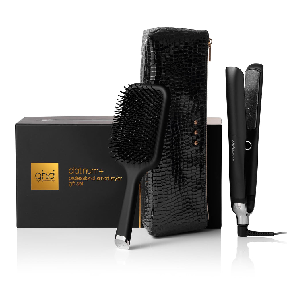ghd Platinum+ flat iron in black with sleek design for salon-quality styling at home.