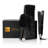 ghd Platinum+ flat iron in black with sleek design for salon-quality styling at home.